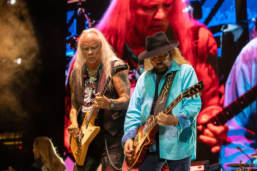 Musician Rickey Medlocke (left) and Gary Rossington (right) of Lynyrd Skynyrd perform during...