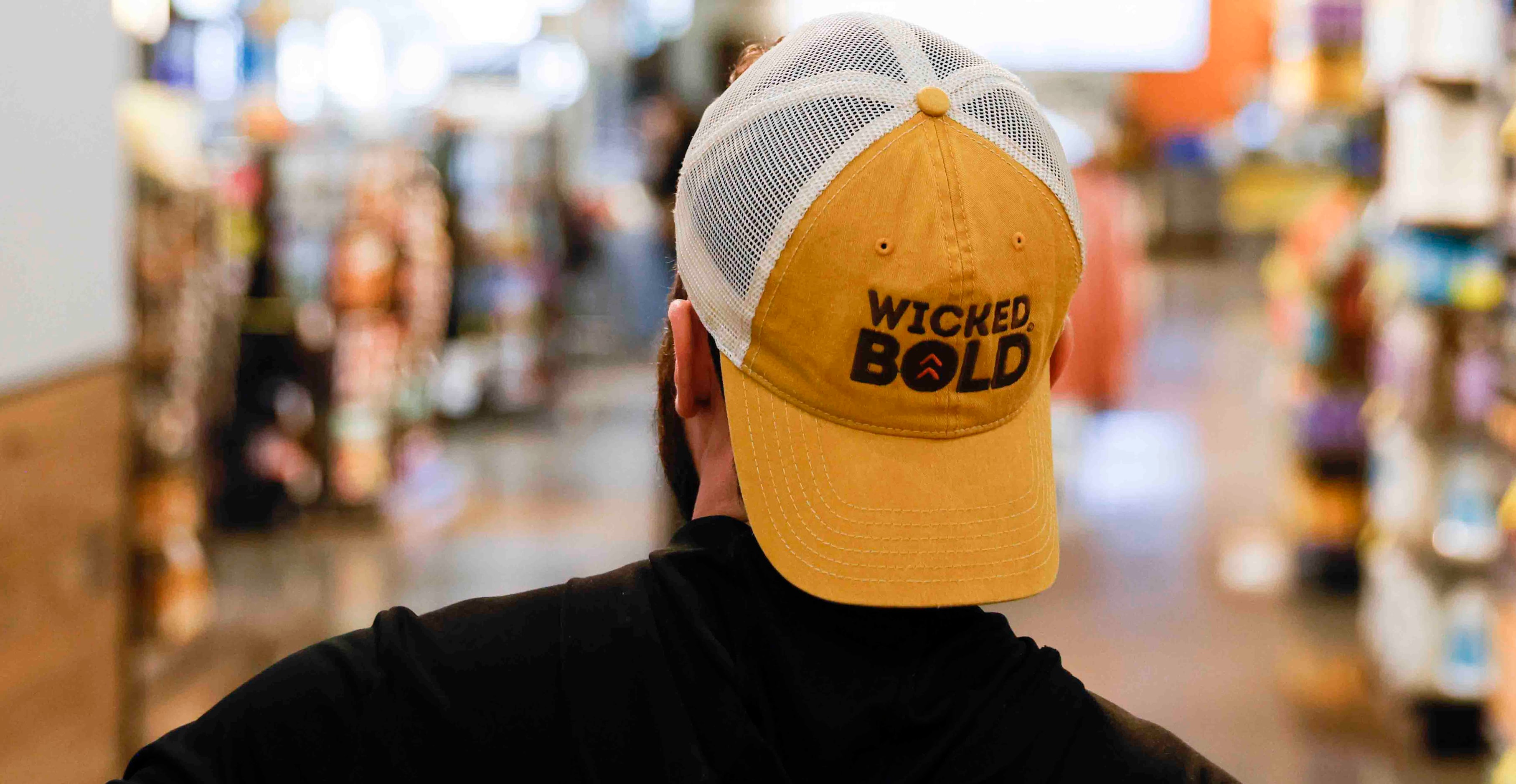 Deric Cahill mostly wears his own Wicked Bold vegan chocolate swag hats and shirts. 