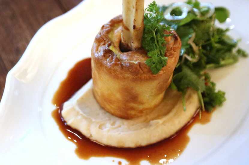 Lamb shank pie is a main course at the Theodore, the new restaurant in NorthPark Center from...