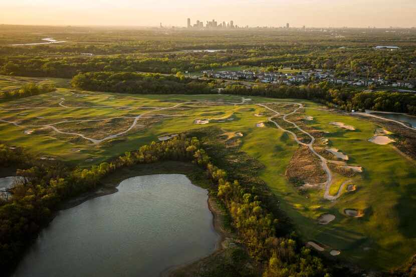Late evening sunlight falls over the still under construction Trinity Forest Golf Club on...