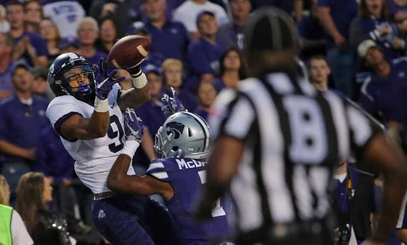 TCU wide receiver Josh Doctson (9) hauls in a 32-yard touchdown pass in the first quarter...