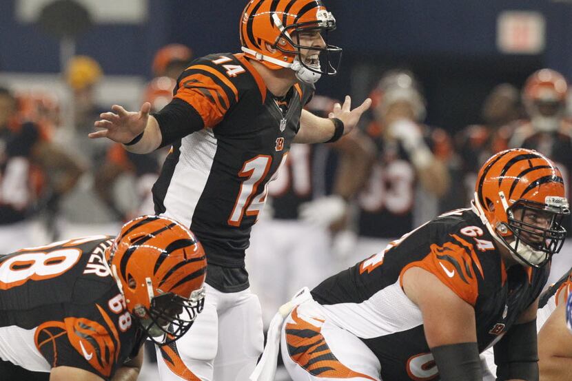 Cincinnati Bengals quarterback Andy Dalton (14) runs the offense against the Dallas Cowboys...