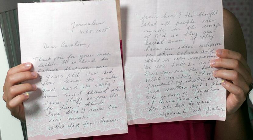 
Caroline holds a handwritten letter she received from Holocaust survivor Hannah Goslar...