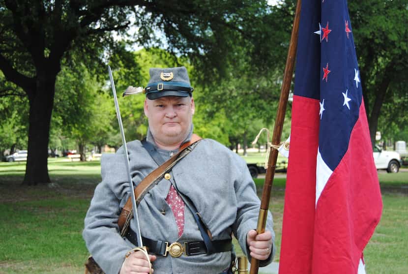 Andrew Bass of Dallas wears the uniform of the Cherokee Rifles, a Confederate regiment that...