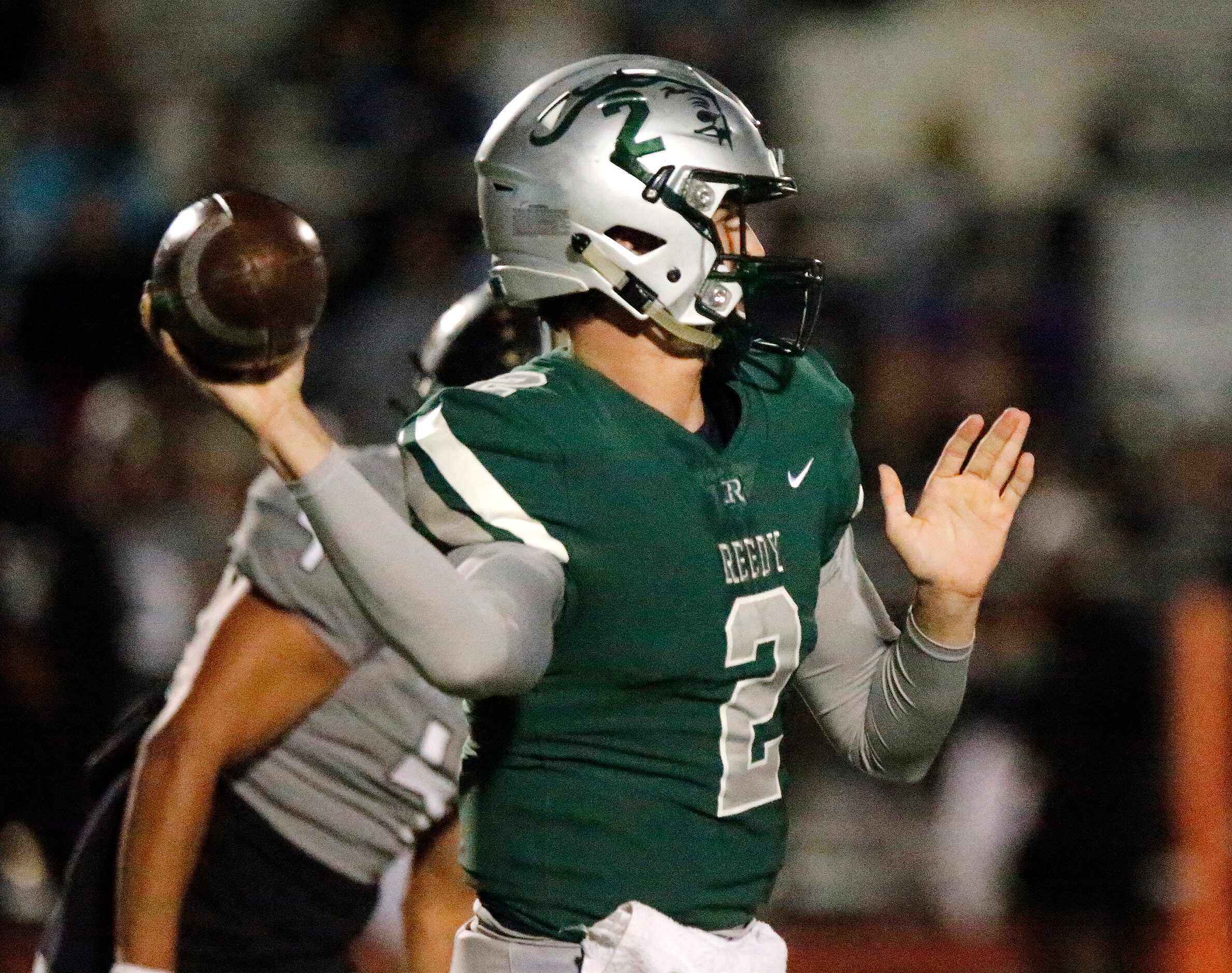 Frisco Reedy High School quarterback A.J. Padgett (2) throws a pass during the first half as...