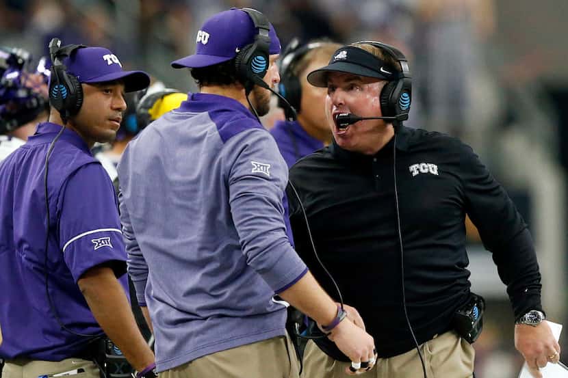 TCU Horned Frogs head coach Gary Patterson (right) is upset with a defensive assistant after...