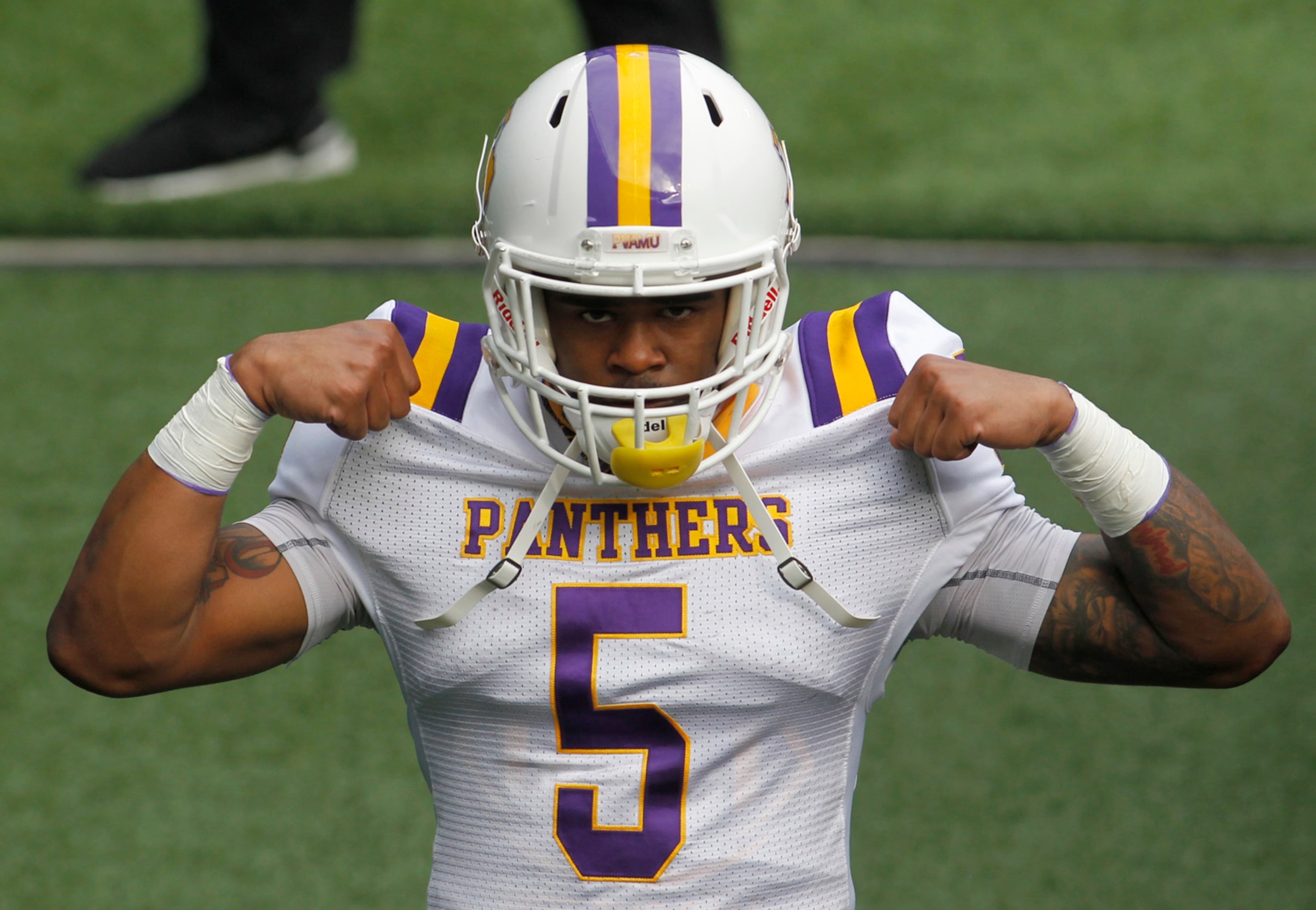 Prairie View A&M back Ahmad Antoine (5) flexes as he enters the tunnel to the team locker...