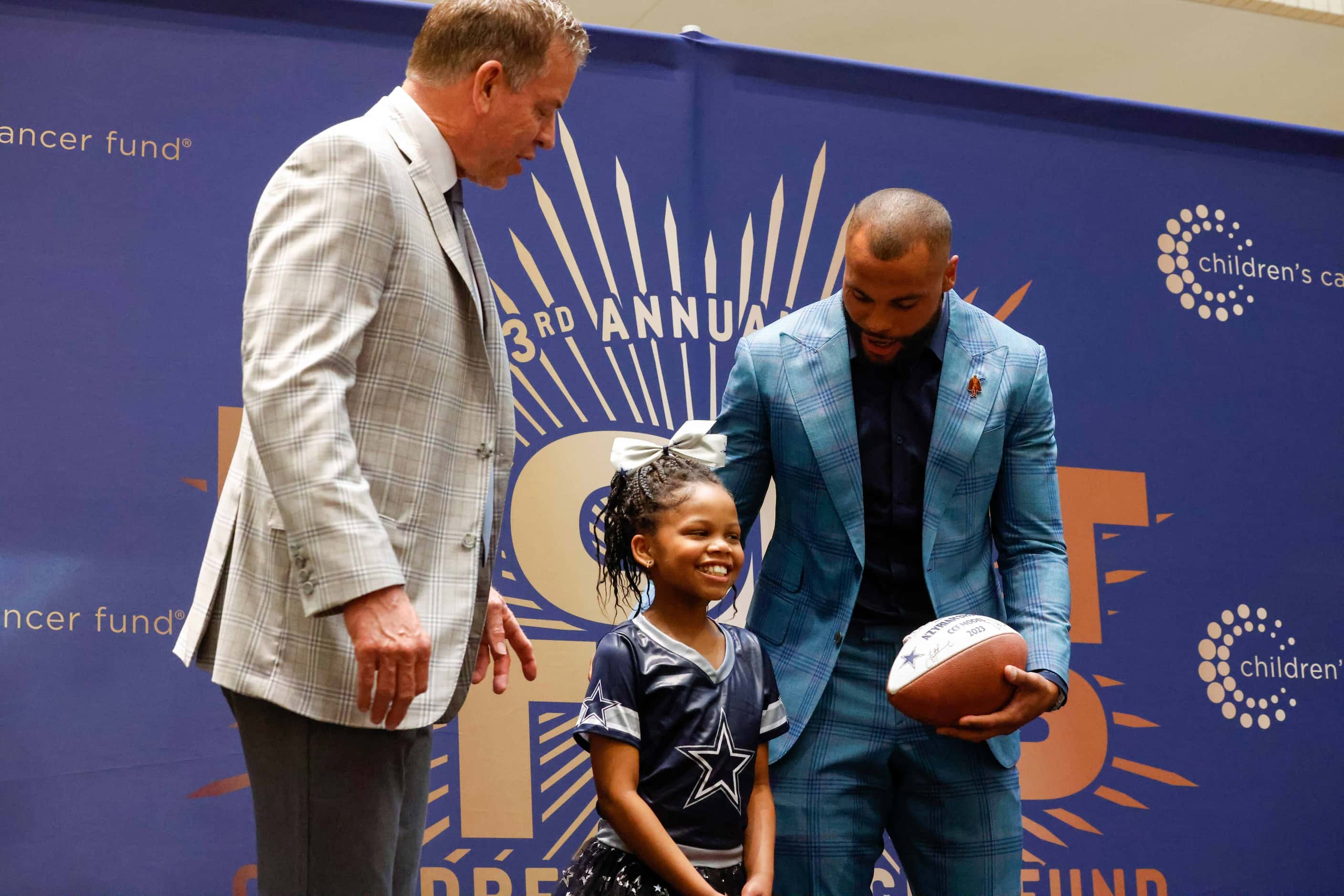 Dallas Cowboys Troy Aikman and Dak Prescott introduce A'zyriah Brown as a model for the...