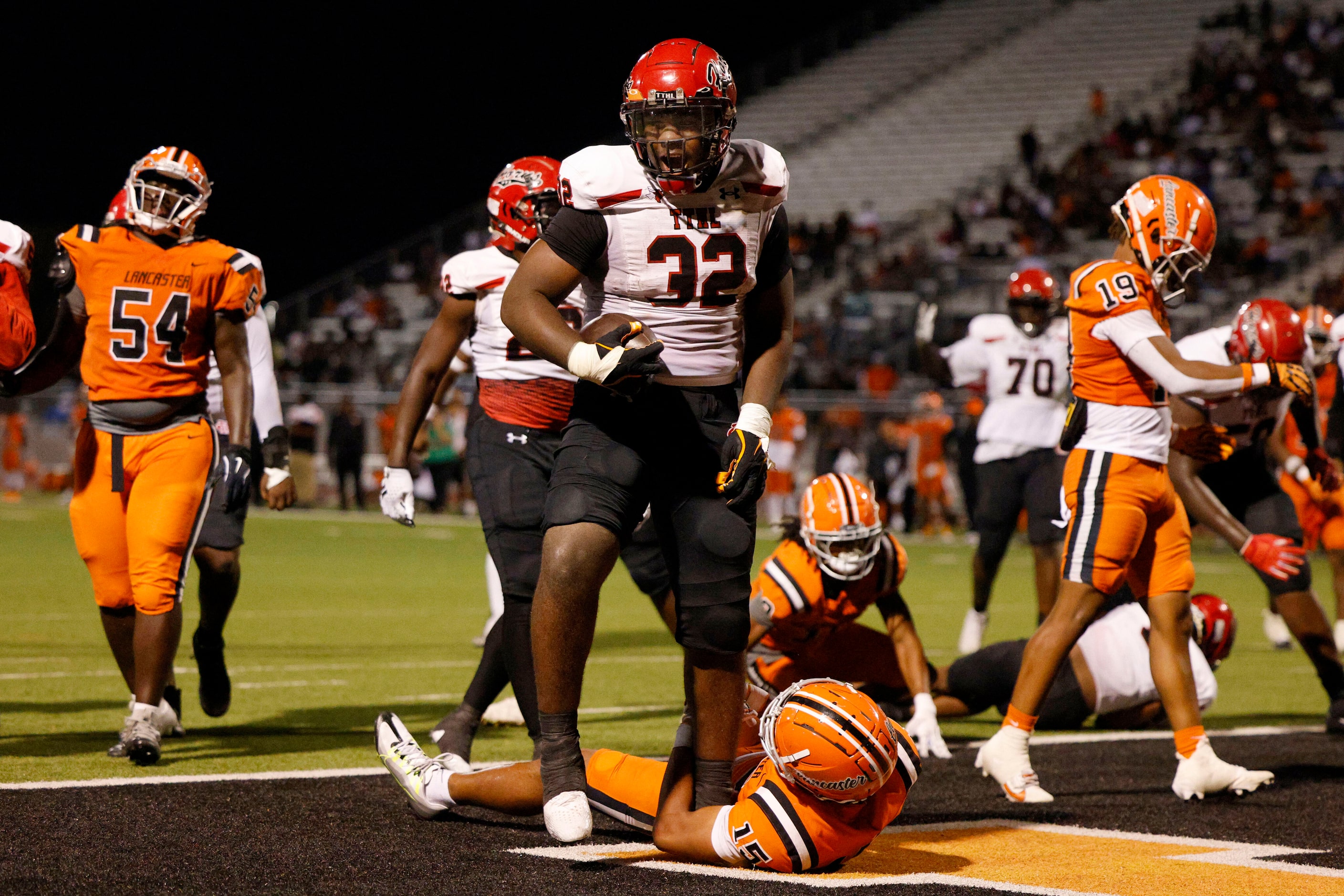 Cedar Hill running back Jalen Brewster (32) celebrates after scoring a touchdown during the...