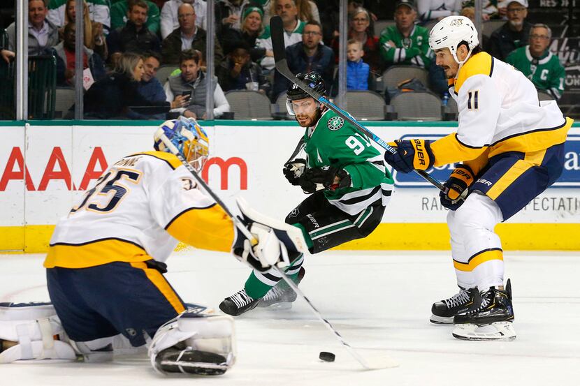 Dallas Stars center Tyler Seguin (91) watches his shot on goal get stopped by Nashville...