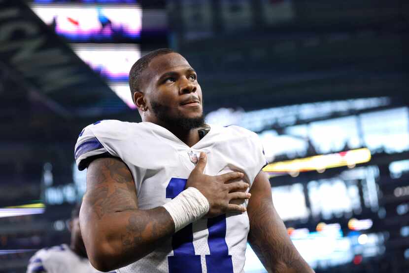 Dallas Cowboys outside linebacker Micah Parsons (11) puts his hand over his heart as he...