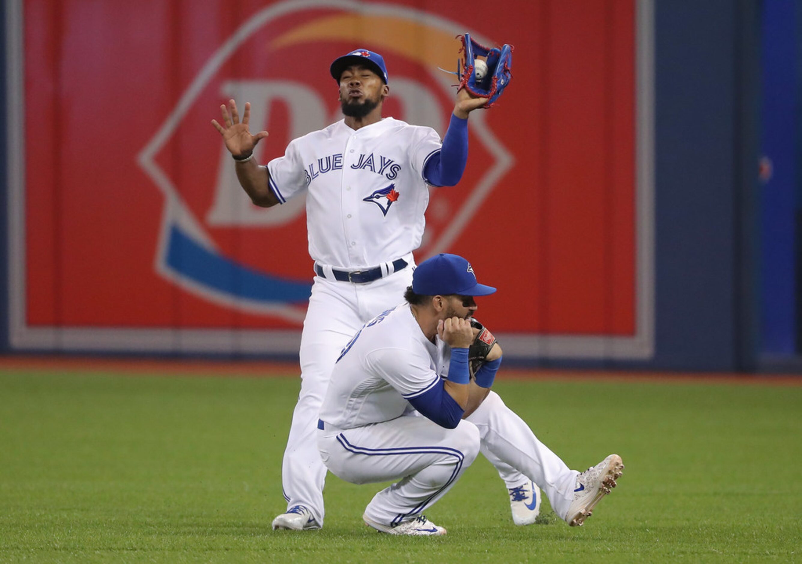 TORONTO, ON - APRIL 27: Teoscar Hernandez #37 of the Toronto Blue Jays catches a fly ball as...