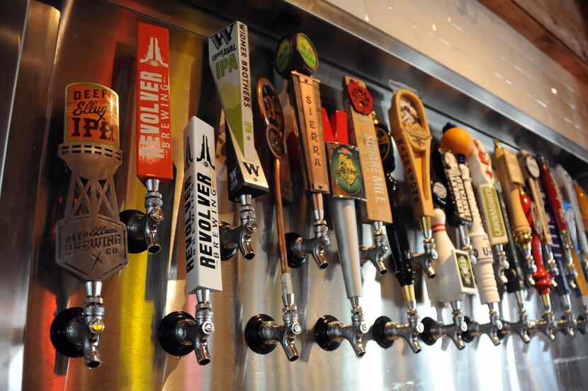 The bar features 24 craft beers on tap including 8 local brews at Ten 50 BBQ in Richardson.