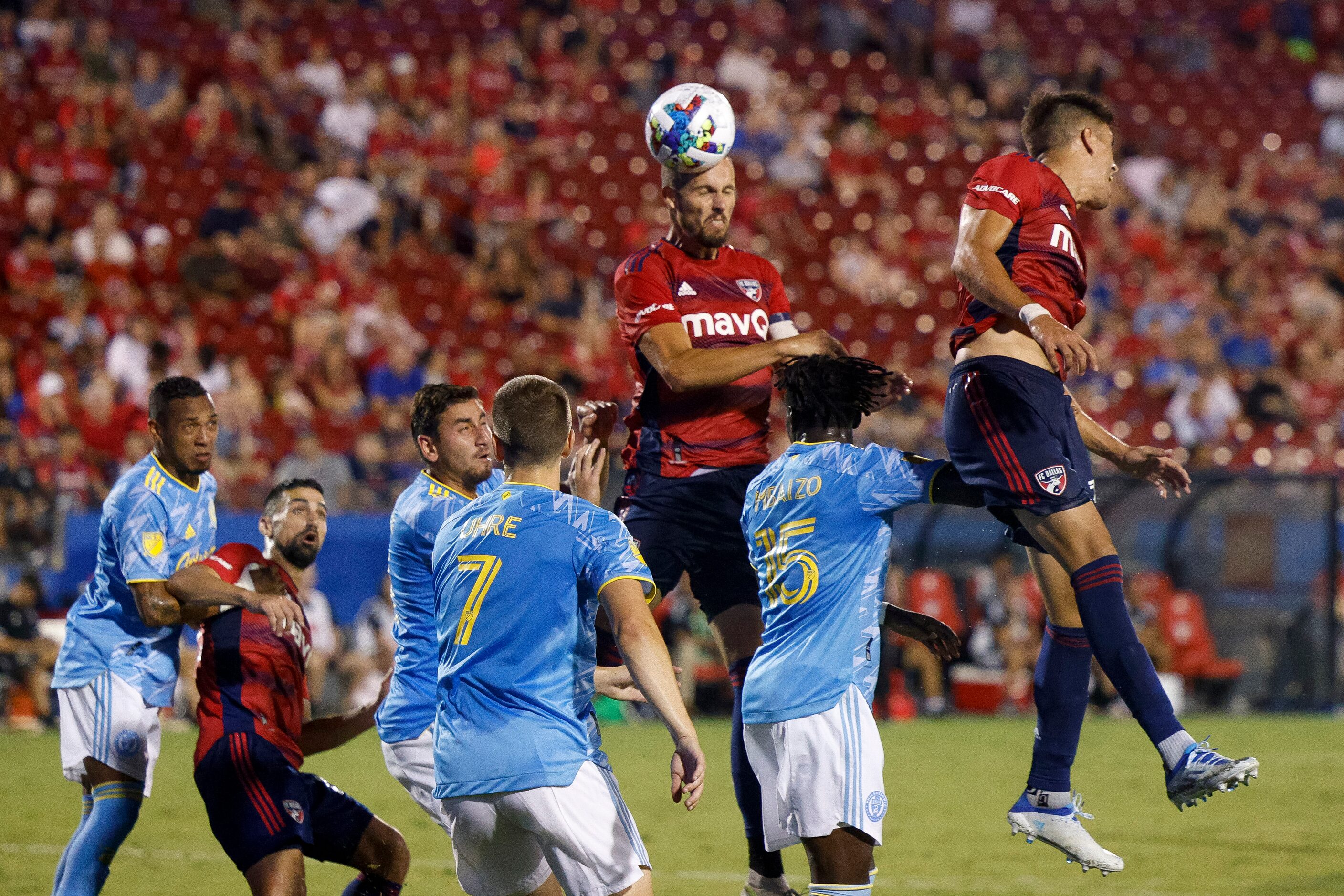 FC Dallas defender Matt Hedges (24) heads the ball towards goal over the Philadelphia Union...