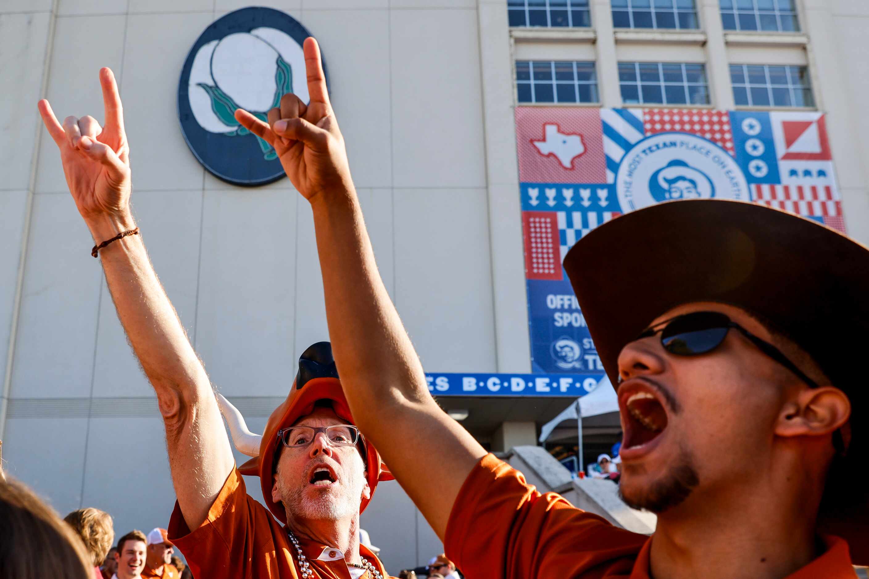 Chris Stewart from Austin cheers ahead of the Red River Showdown at the Cotton Bowl, on...