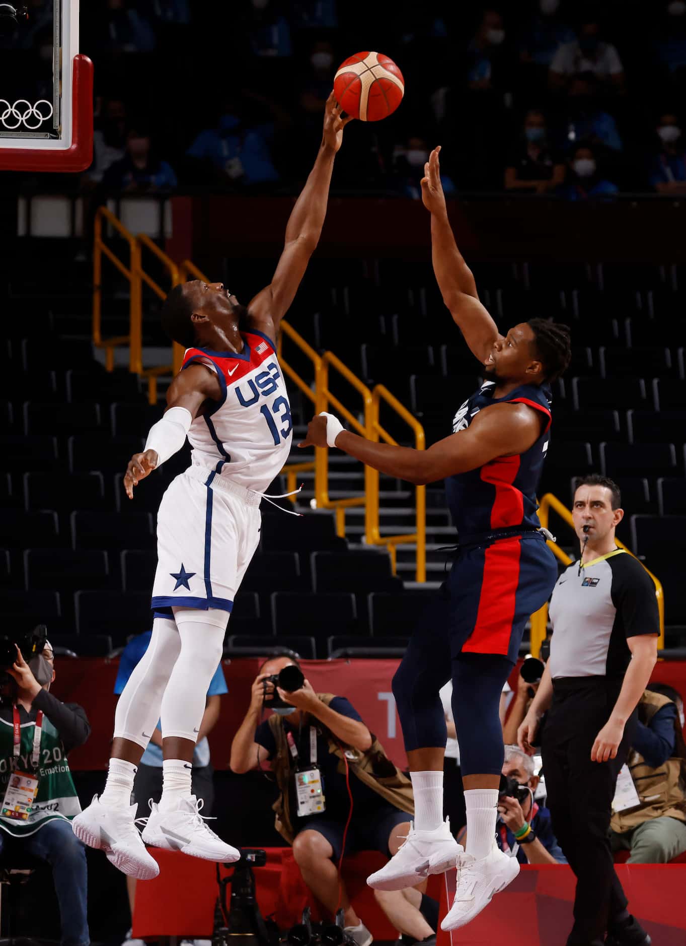 USA’s Bam Adebayo (13) blocks a shot from France’s Guerschon Yabusele (7) during the first...