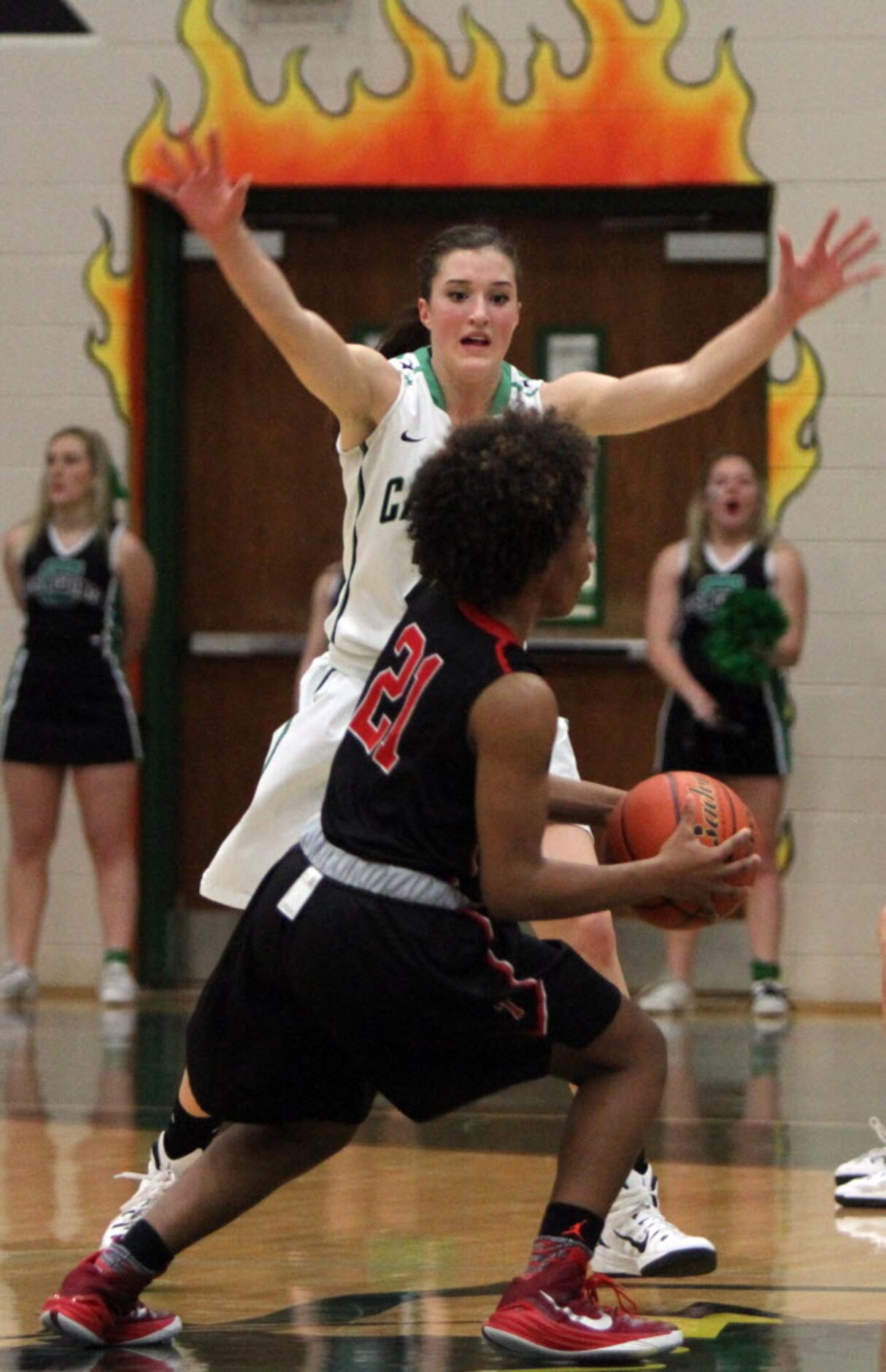 Southlake Carroll forward Priscilla Smeenge (23) defends as Euless Trinity guard Haleigh...