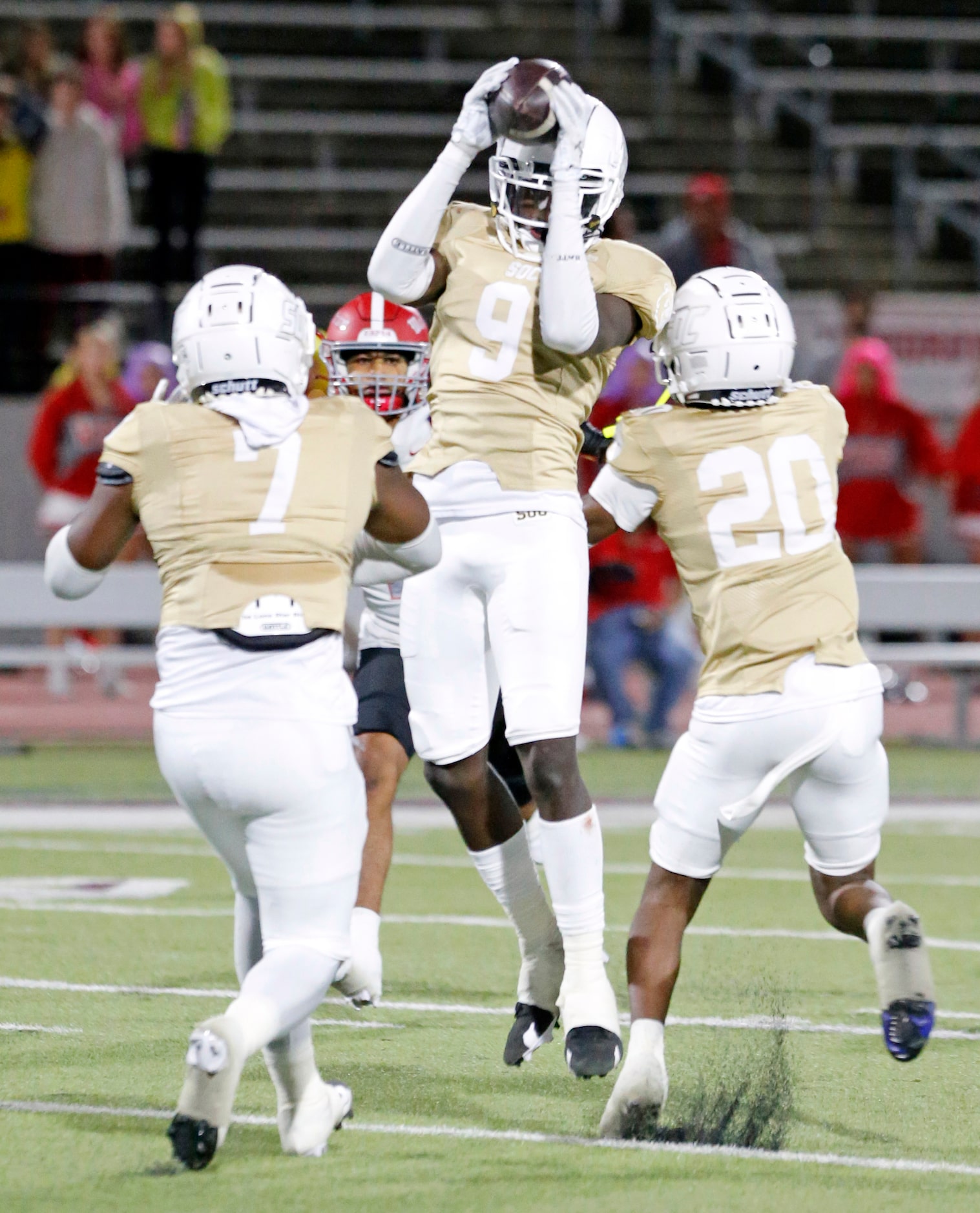 South Oak Cliff High defender Jayden Sheldon (9) grabs an interception during the first half...