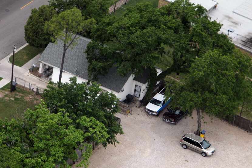 An aerial view of the back yard of the house located at 3116 South Harwood in Dallas, with a...