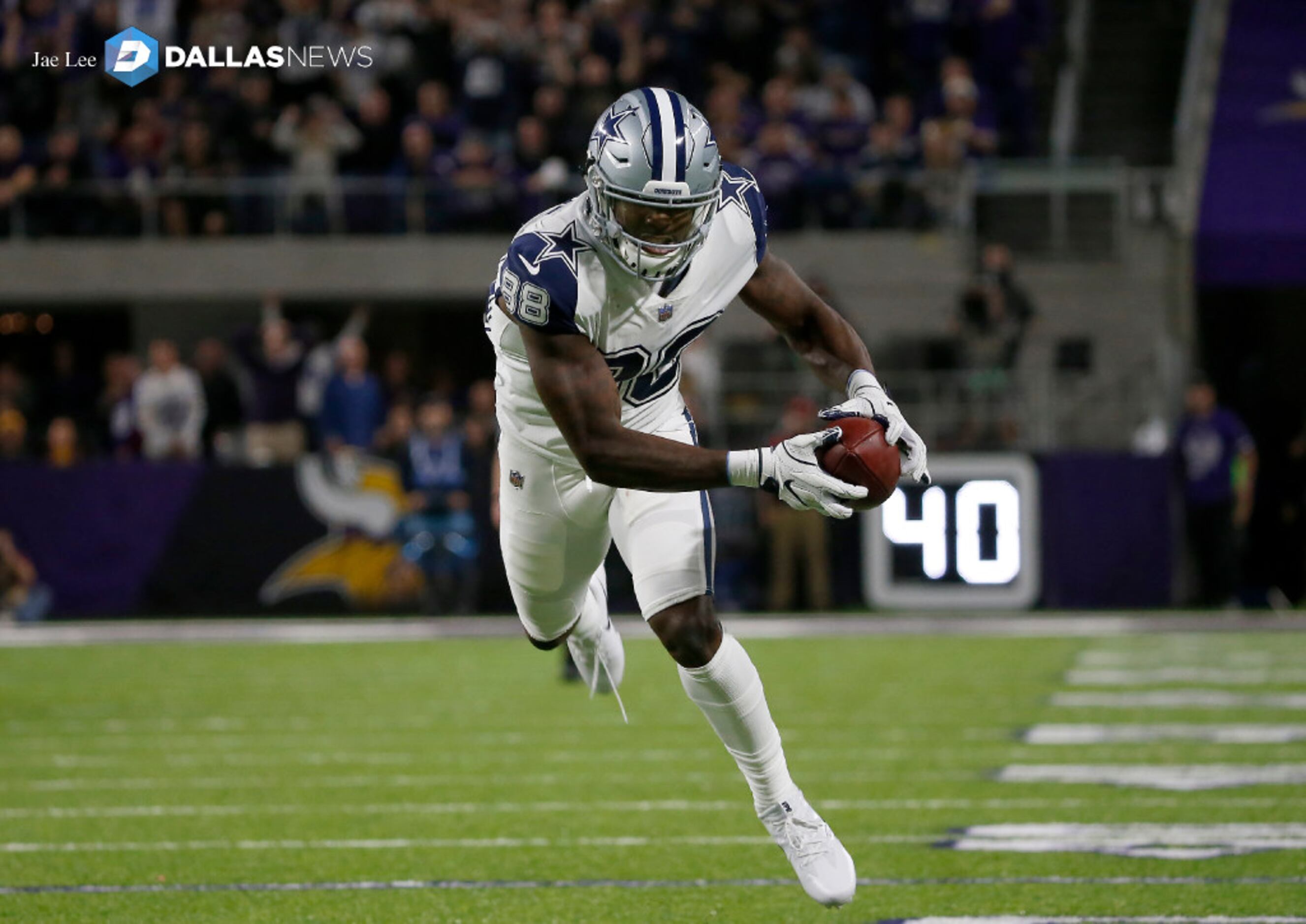 Dallas Cowboys wide receiver Dez Bryant (88) break a long run after catch  in the first quarter as the Cowboys play the Jets in East Rutherford ,NJ,  Sunday, Sept. 11, 2011. (Photo