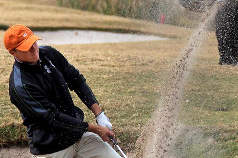  November 15, 2012--Jordan Spieth hits out of a bunker on the 14th hole at the PGA...