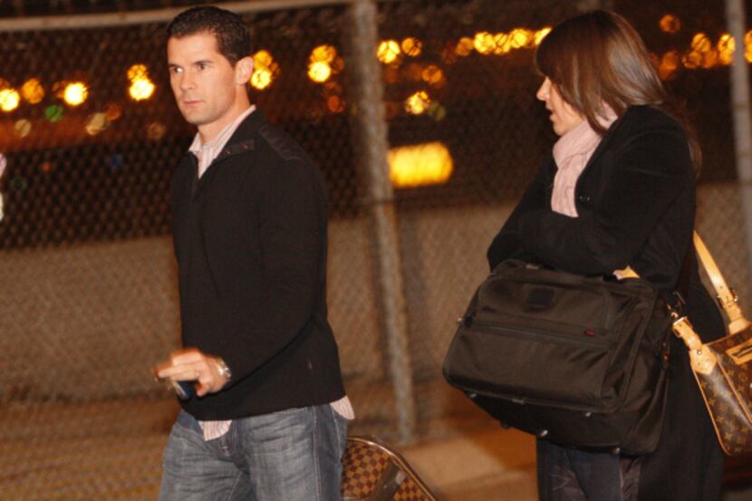 Texas Rangers player Michael Young arrives at the Dallas Fort Worth International Airport,...