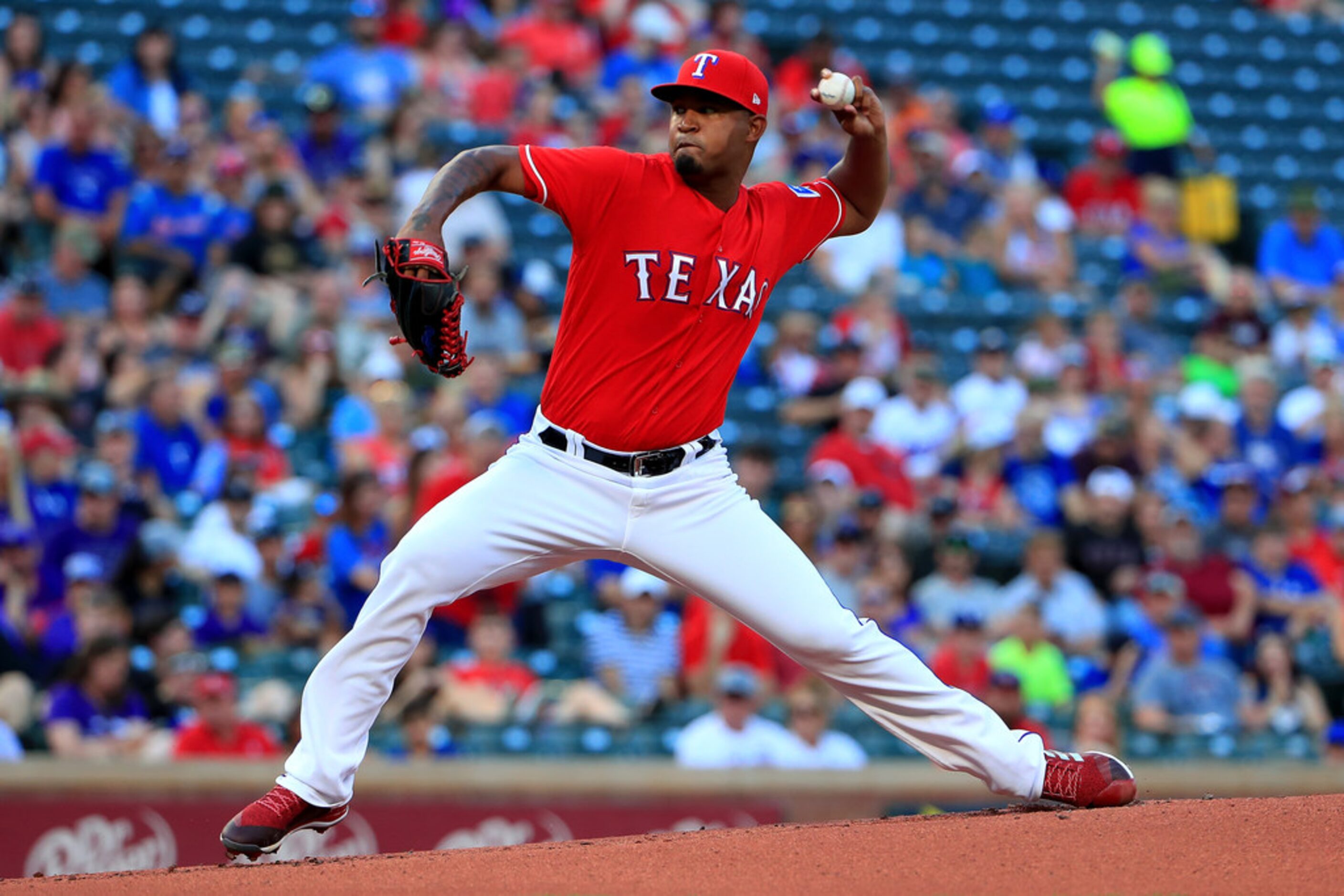 ARLINGTON, TX - JUNE 15:  Yohander Mendez #65 of the Texas Rangers pitches against the...