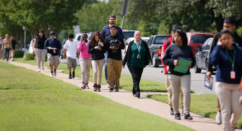 
Gaston Middle School students walk on Mariposa Drive in the Alger Park-Ash Creek...