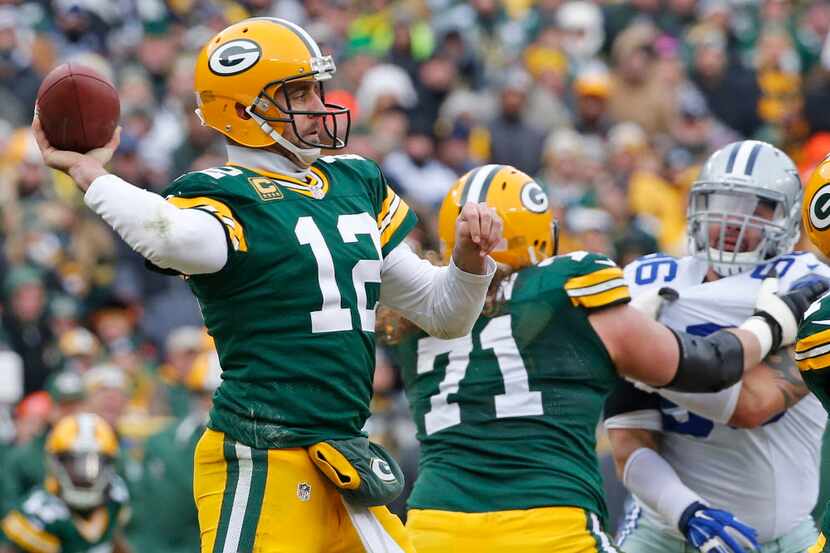 Green Bay Packers quarterback Aaron Rodgers (12) throws a pass during the Dallas Cowboys vs....