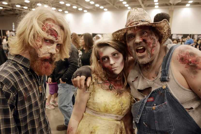 Cutting Edge Haunted House zombies from left Brenden Allen, Jessica Love and Lee Schulz pose...