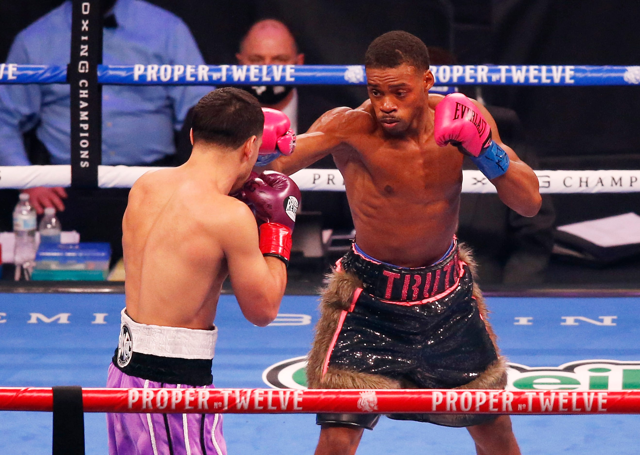 Errol Spence, Jr. and Danny García fight during the first round of a WBC & IBF World...