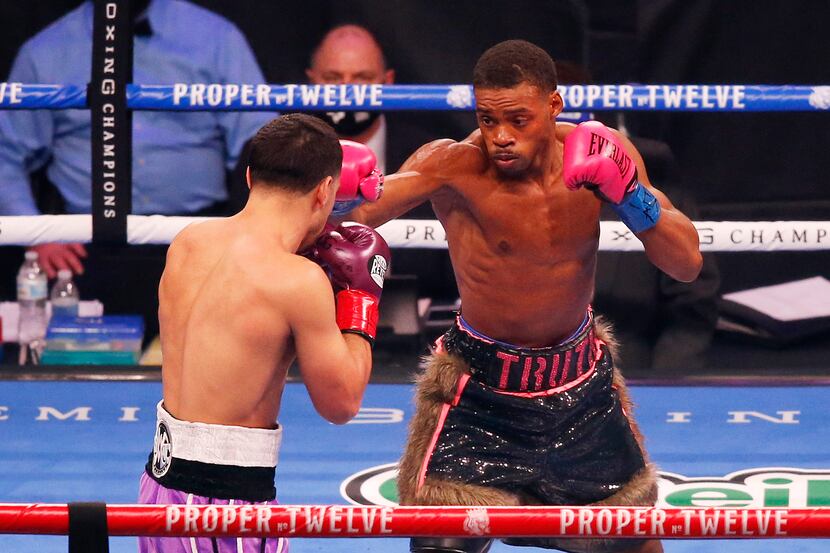 Errol Spence, Jr. and Danny García fight during the first round of a WBC & IBF World...