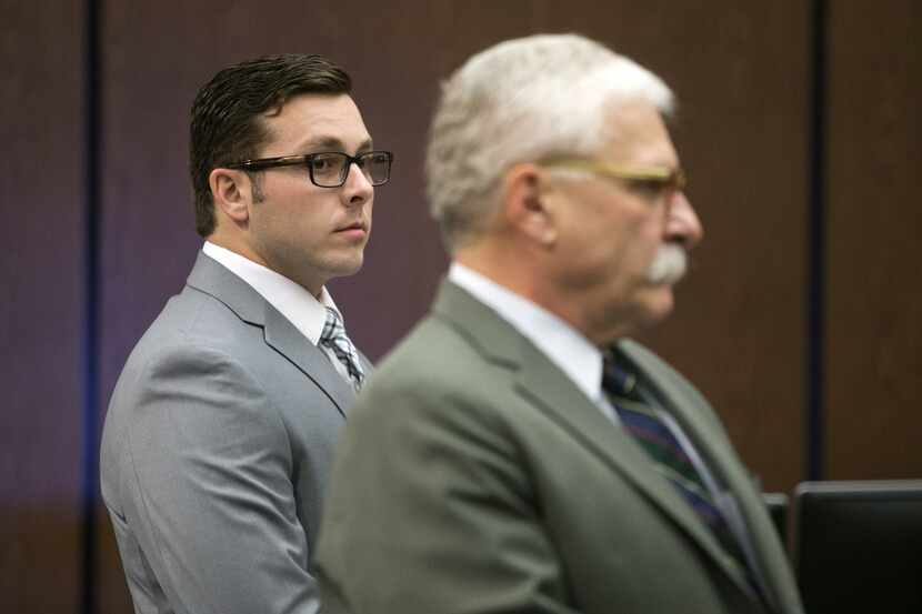 Former Mesa police Officer Philip Brailsford and his attorney, Mike Piccarreta, stand at the...