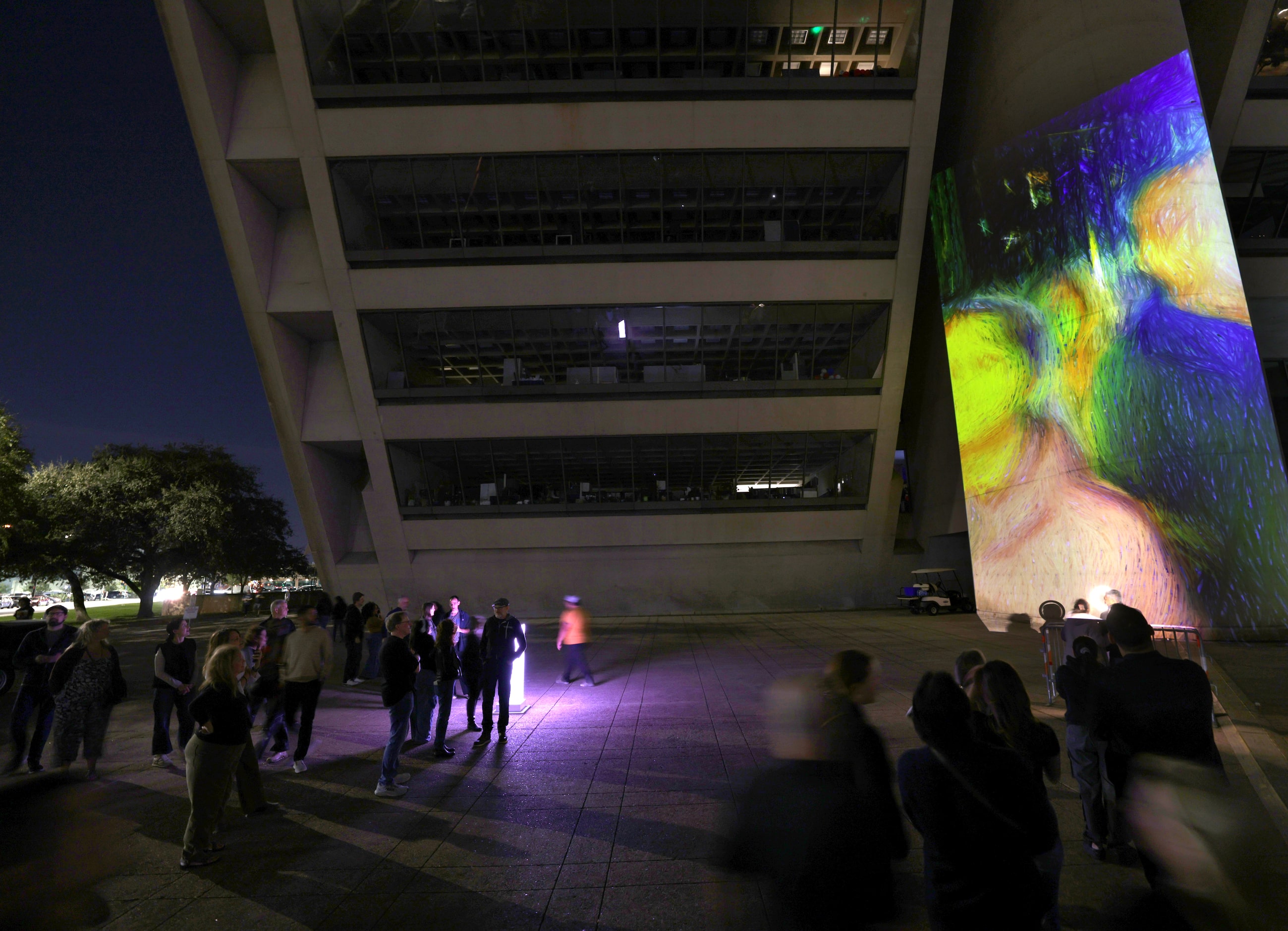 Community members interact with art installations during Aurora in downtown Dallas, TX, on...