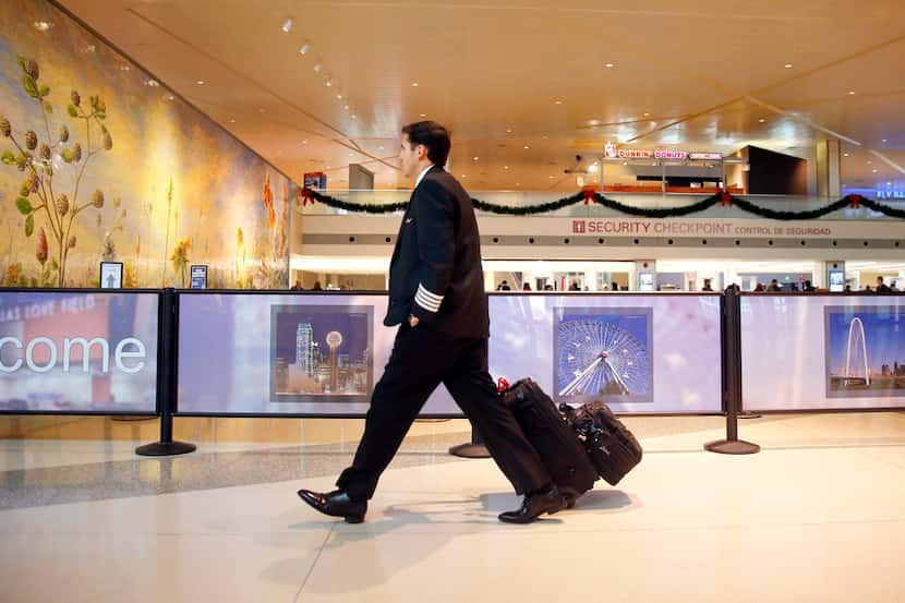 A Southwest Airlines pilot arrives for work at Dallas Love Field.