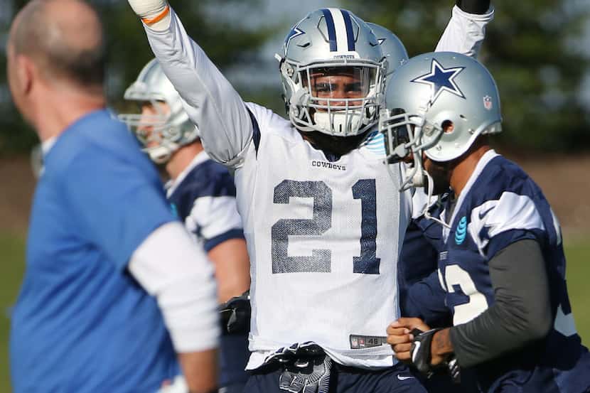 Dallas Cowboys running back Ezekiel Elliott (21) dances during team practice at The Star in...