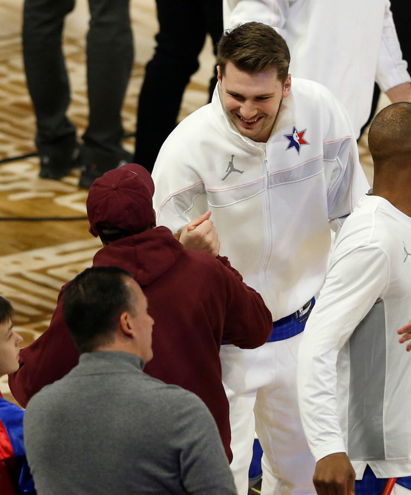 Team LeBron's Luka Doncic of the Dallas Mavericks meets Spike Lee before a game against Team...