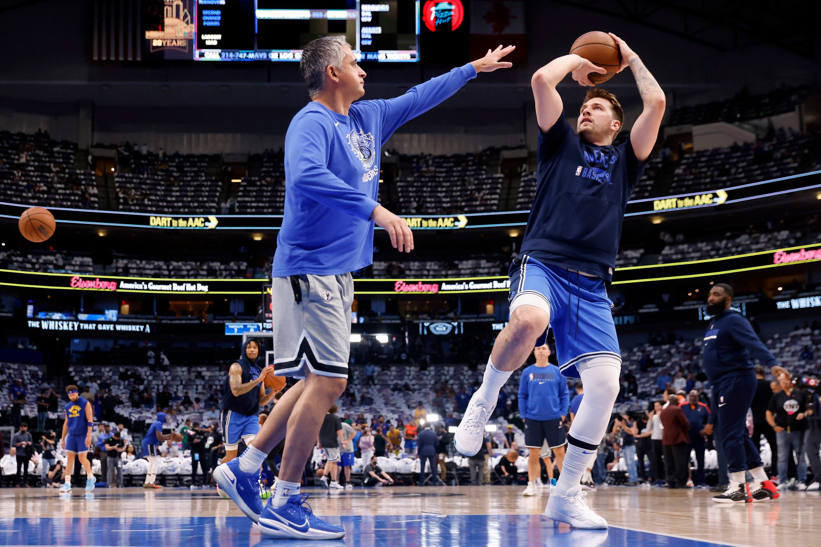 Dallas Mavericks guard Luka Doncic (77) warms up before facing the Golden State Warriors in...