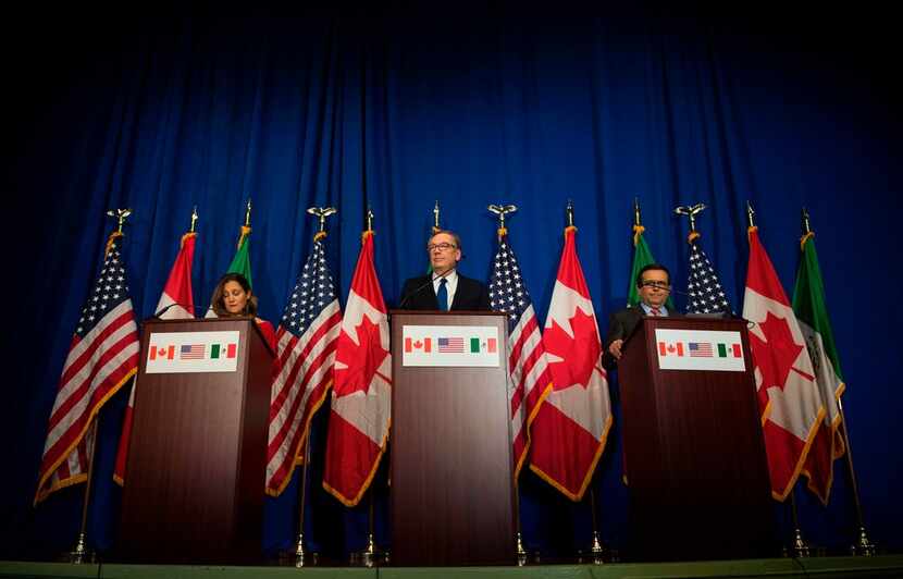 U.S. Trade Representative Robert Lighthizer (center), Canadian Foreign Minister Chrystia...