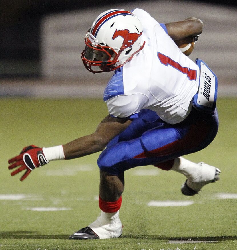 J.J. Pearce junior running back Corey Coleman (1) looks for room agains the Wylie defense in...