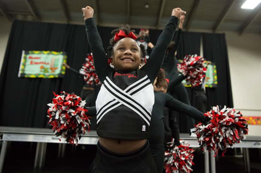 Triple D Buckeyes cheerleader Samari Johnson, 5, performs at the 27th Annual KwanzaaFest at...