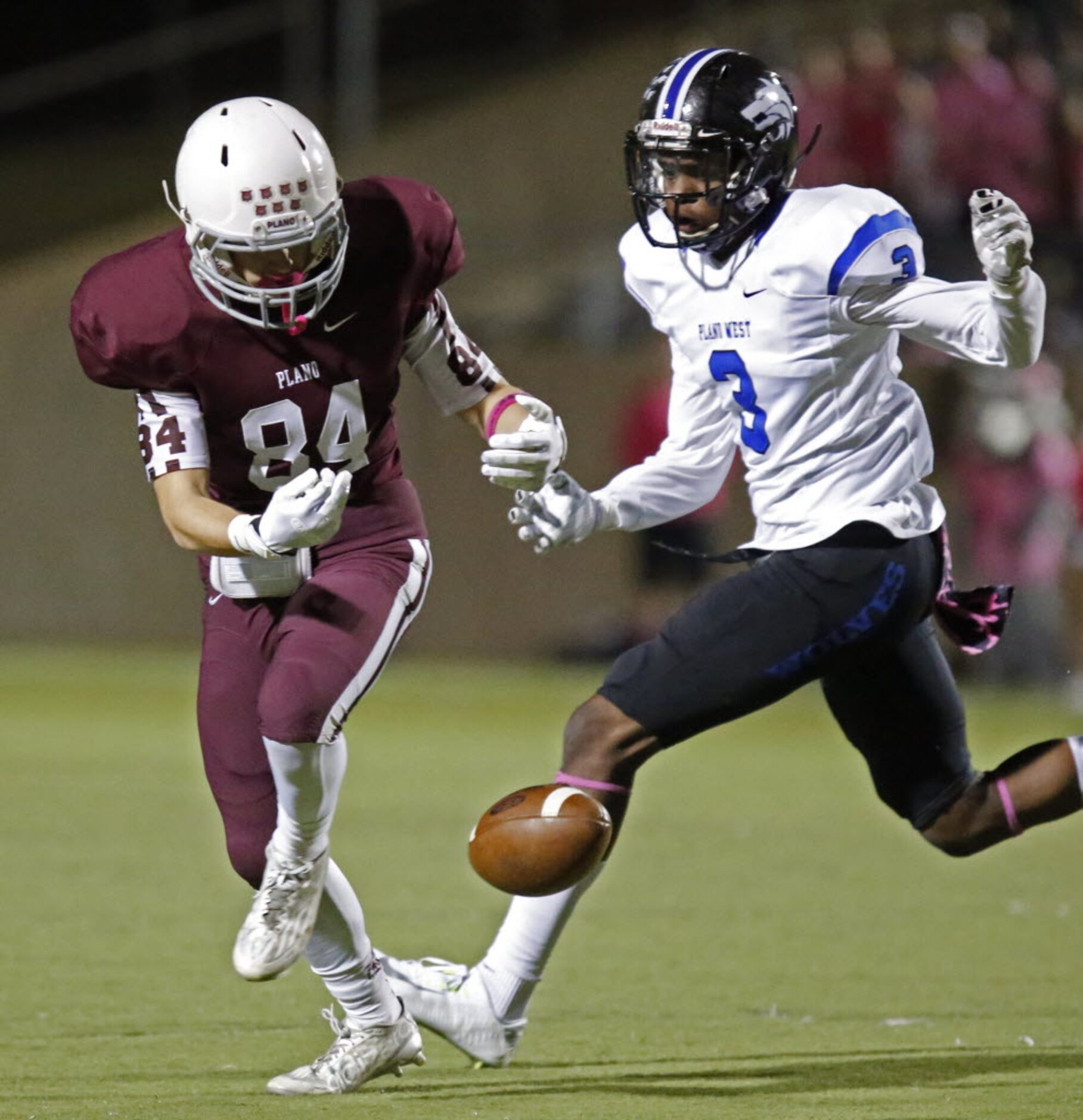 Plano High School wide receiver Garrett Frederick (84) was unable to hang onto the pass...