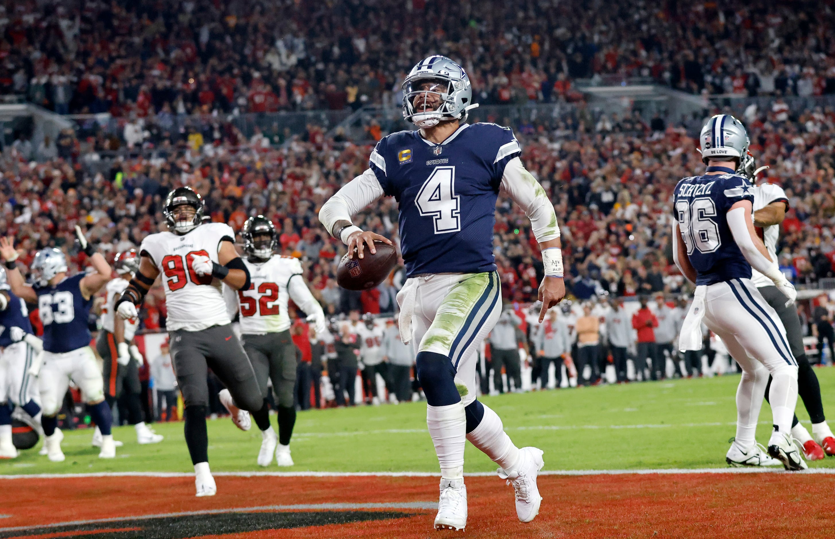 PHILADELPHIA, PA - OCTOBER 16: Dallas Cowboys Quarterback Cooper Rush (10)  hands off the ball to Dallas Cowboys Running Back Ezekiel Elliott (21)  during the second half of the National Football League