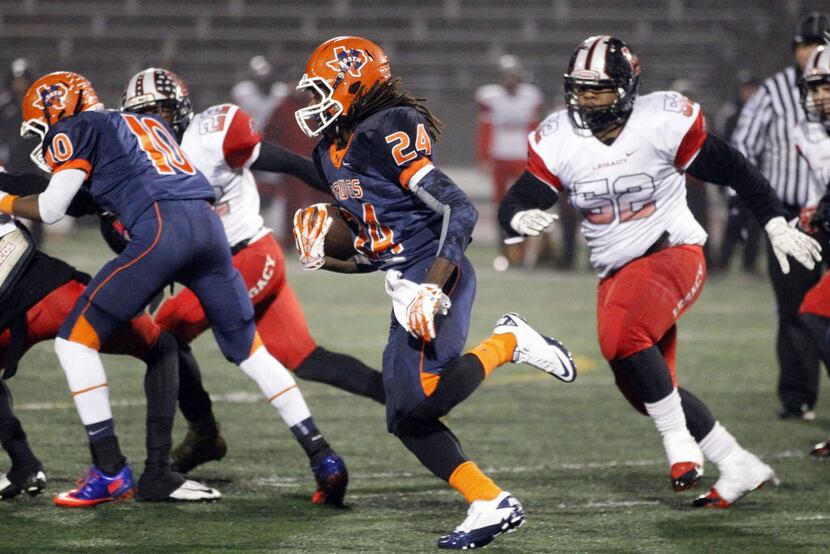 McKinney North High's Ronald Jones (24) breaks loose on for the team's second touchdown, as ...