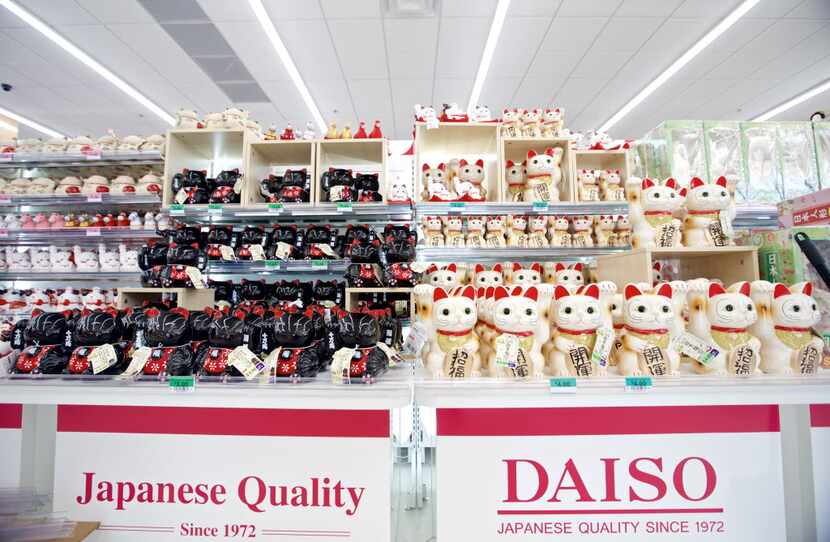  Japanese "Lucky Cats" for sale at Daiso, a Japanese dollar store, in Carrollton. The store...