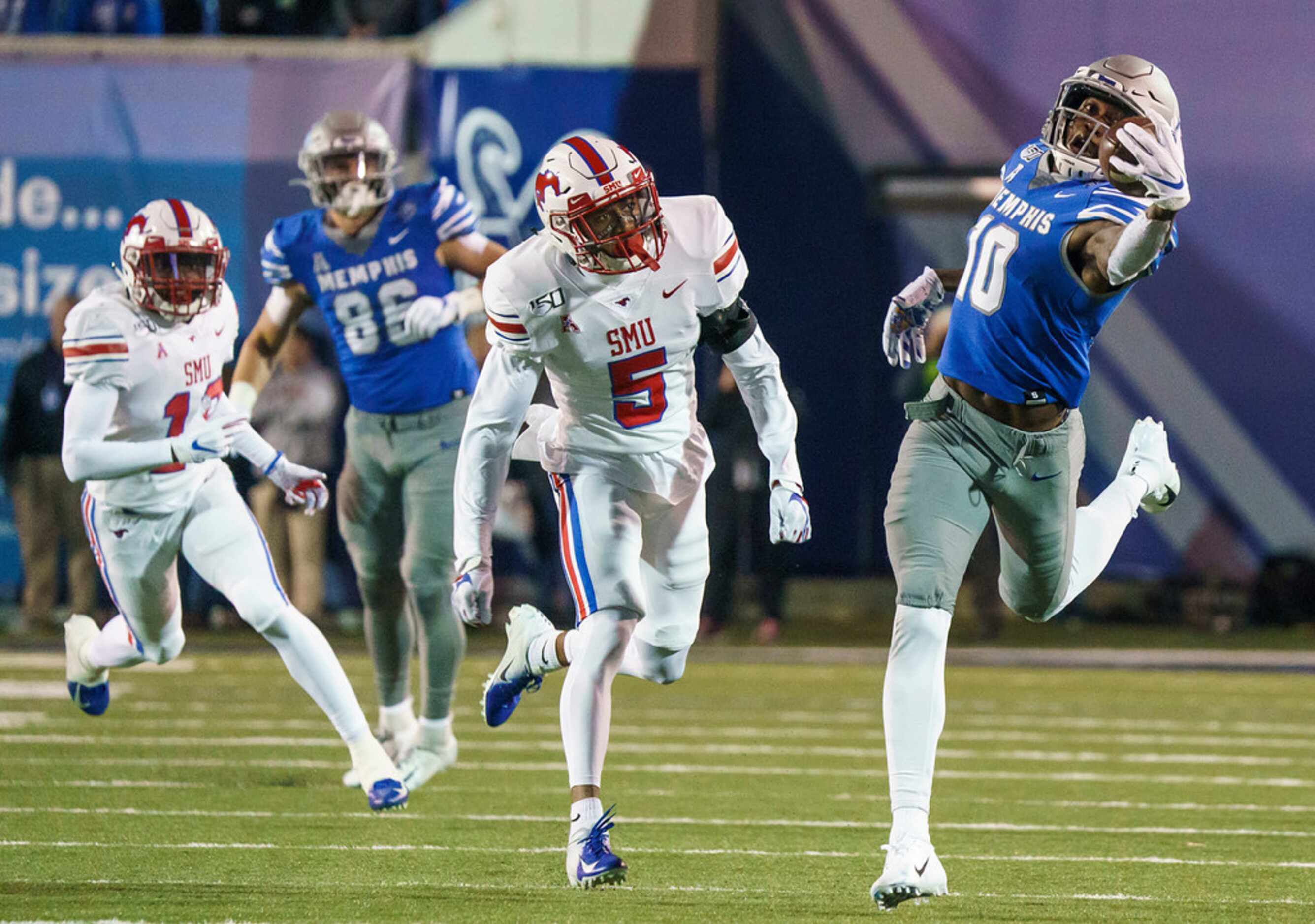 Memphis wide receiver Damonte Coxie (10) makes a one-handed catch past SMU cornerback...
