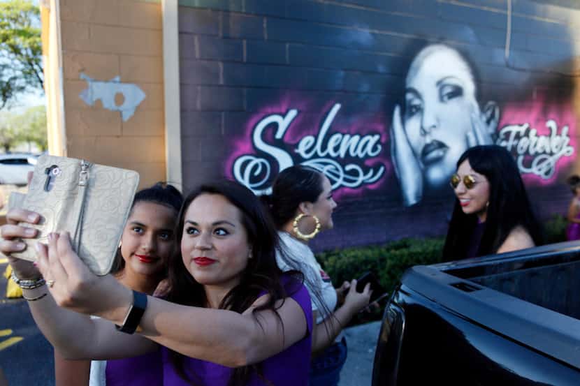 Natalia Quinones, 12, and her mother, Maricela Iraheta, pose for a photo in front of a...
