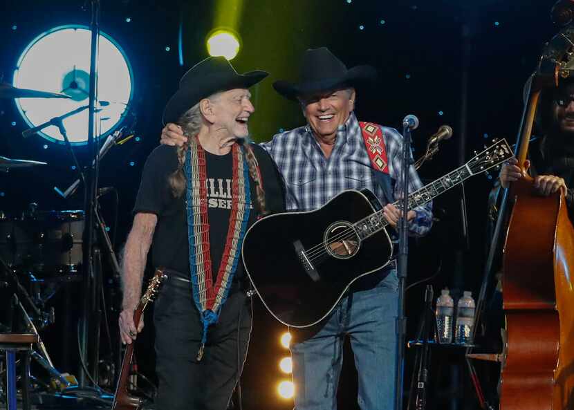 Willie Nelson, left, and George Strait perform at Willie: Life & Songs Of An American Outlaw...