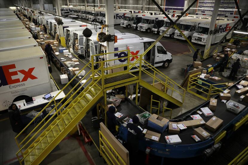 FedEx Express package sorting facility in Chicago, Monday, Dec. 10, 2018.