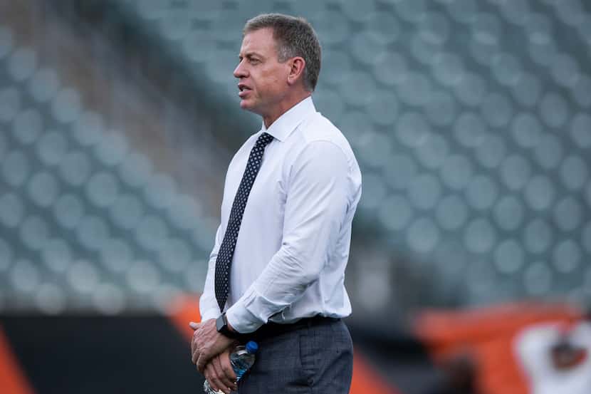 FILE - Troy Aikman stands on the field before an NFL football game between the Jacksonville...